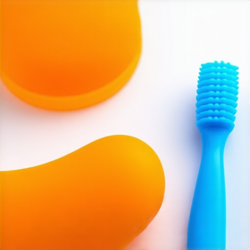 A child-friendly silicone tongue scraper and toothbrush on a counter.