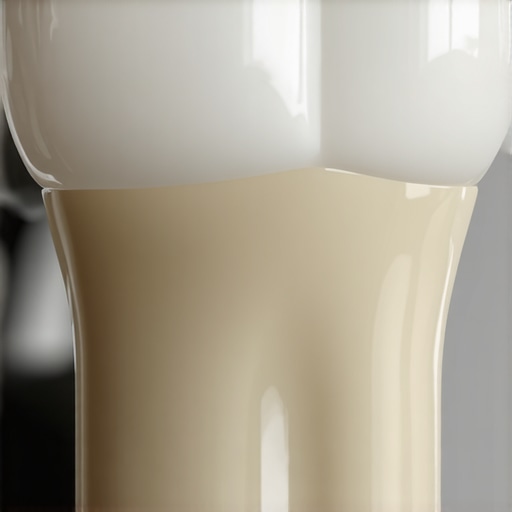 Close-up of a ceramic dental crown highlighting the margin and material quality for longevity.